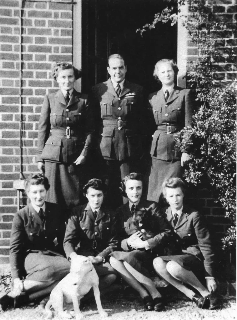 Harry Broadhurst with Waafs outside ops room Hornchurch